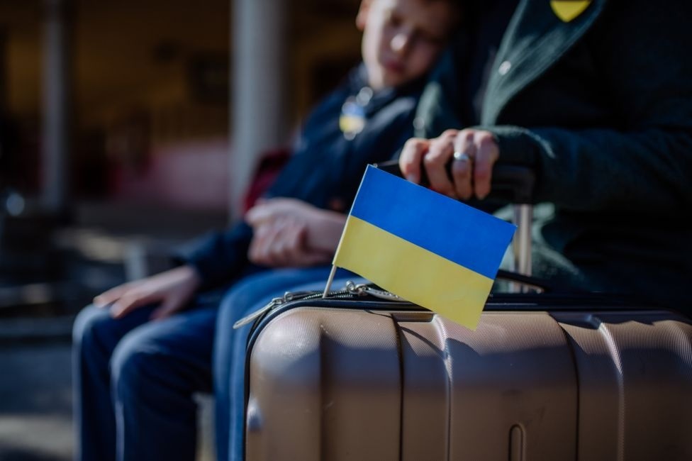 українці