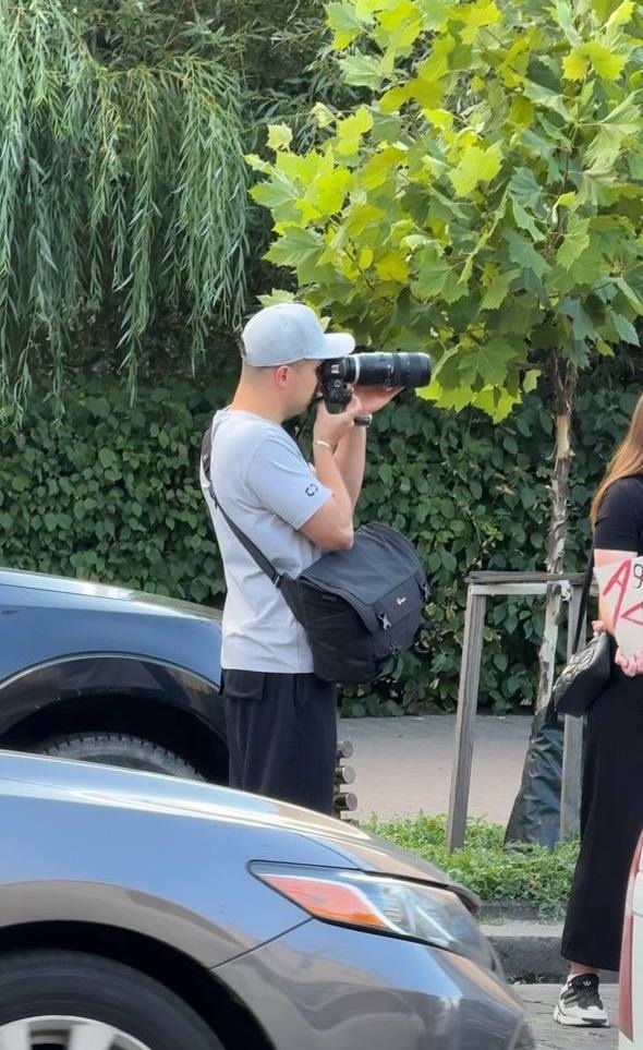 Андрій фотографує під час однієї з акцій