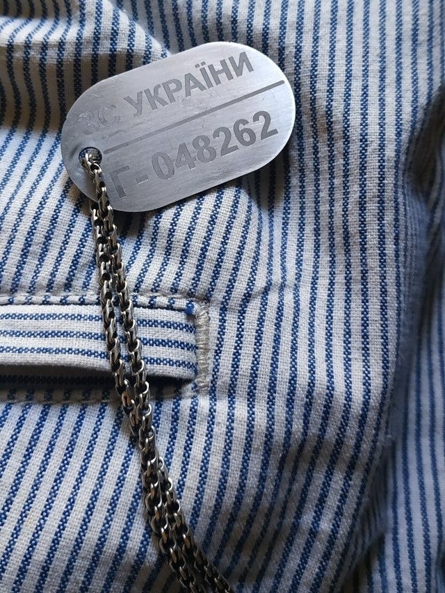 Ольга носить жетон сина