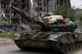 Увидела свой бойлер на российском танке. О том, что ее ограбили, попаснянка узнала из соцсетей