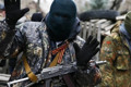 Что делают в России боевики, которые воевали на Донбассе. И кто ими руководит