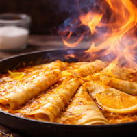 Млинці в апельсиновому соусі з ноткою фламбе