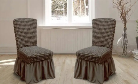 Чохли на стільці: як приховати недоліки меблів та створити преміальний вигляд