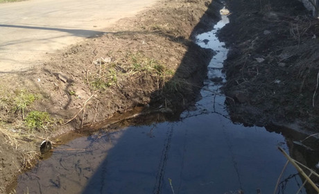Вода через дорогу больше не течет: в Попасной решили проблему по улице Красных Партизан