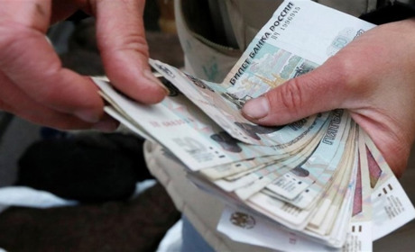 Валютників з Генічеська затримали та погрожують ув’язнити на 4 роки