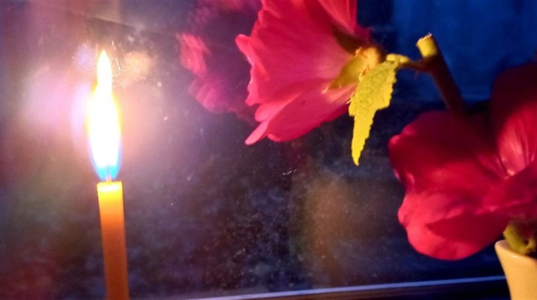 Херсонці запалили свічки пам'яті жертв Голодомору, а ми зібрали архівні фото, які доводять геноцид