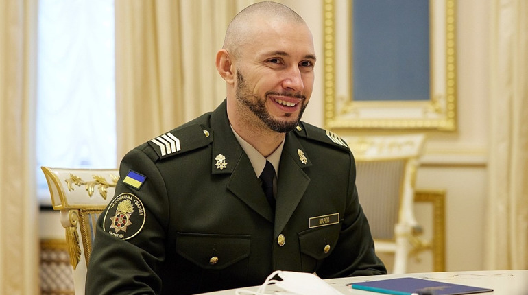 Виставку фото з життя воїна Віталія Марківа, якого засуджували в Італії, відкрили в Херсоні