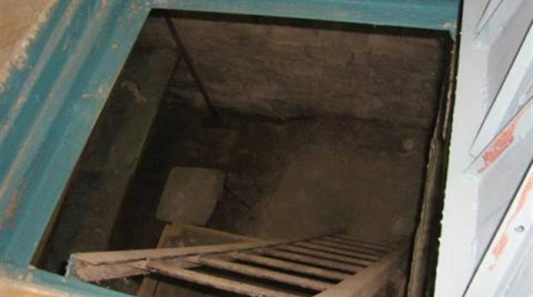 У Холмах на Корюківщині знайшли труп жінки у погребі
