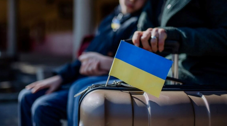 Українці за кордоном: які виплати отримують біженці в країнах Європи у 2024 році