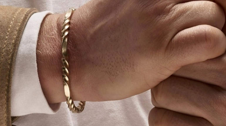 Золотий чоловічий браслет: символ, характер, сенс