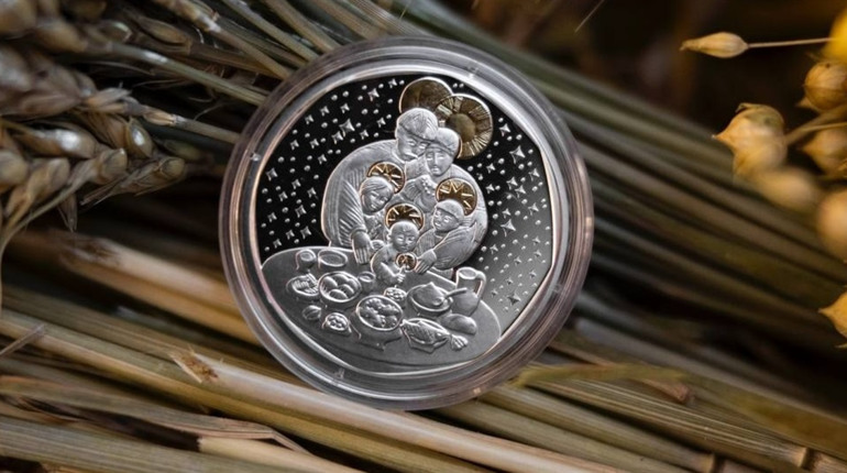 Різдвяні традиції світлого родинного свята у новій монеті «Дух Різдва»