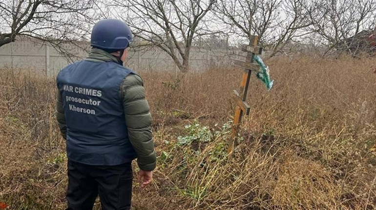 На Херсонщині правоохоронці оглянули місце масового розстрілу місцевих