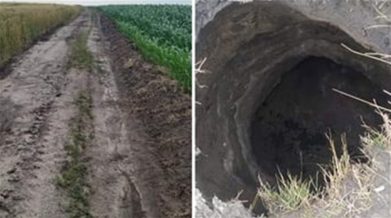 Чергова сенсація? На Чортківщині посеред поля на дорозі утворилося загадкове провалля