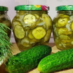 Салат з огірків на зиму “Ніжинський” з цибулею та кропом