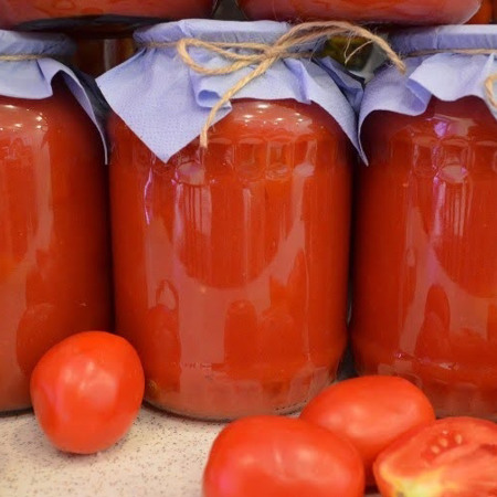 Помідори у власному соку