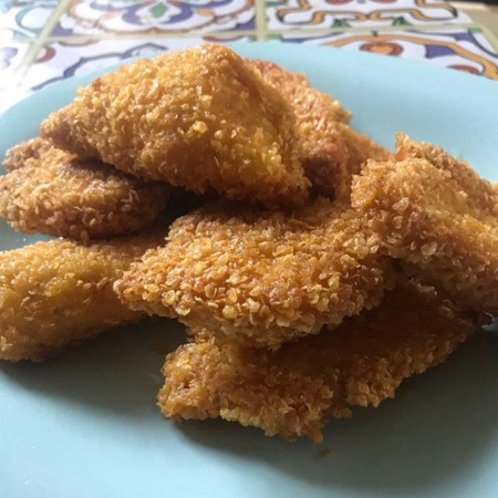 Курячі крильця у паніровці