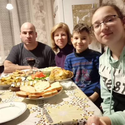 Микола, Лідія, Ольга та Назар Малюки