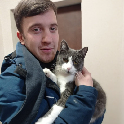 Іван Нечитайло з котом Лео