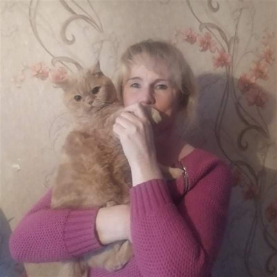 Людмила Невмериченко з Том породи скотіш фолд 