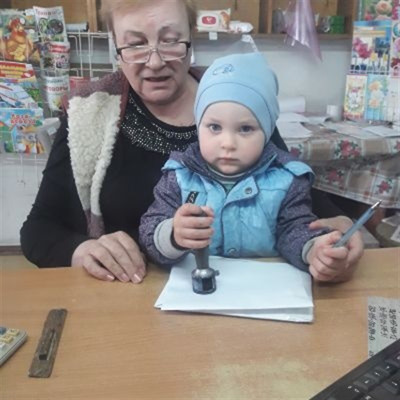 Марія Дем’янчук, 64 роки, з внуком Захаром