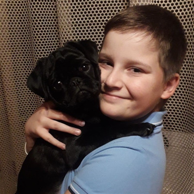 Олег Попович та його друг мопс Бенд