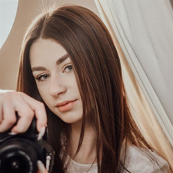 Фотографи та оператори